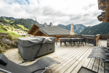 Terrasse avec bain à remouds